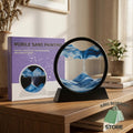 Blue moving sand art picture with a black display stand beside its product box
